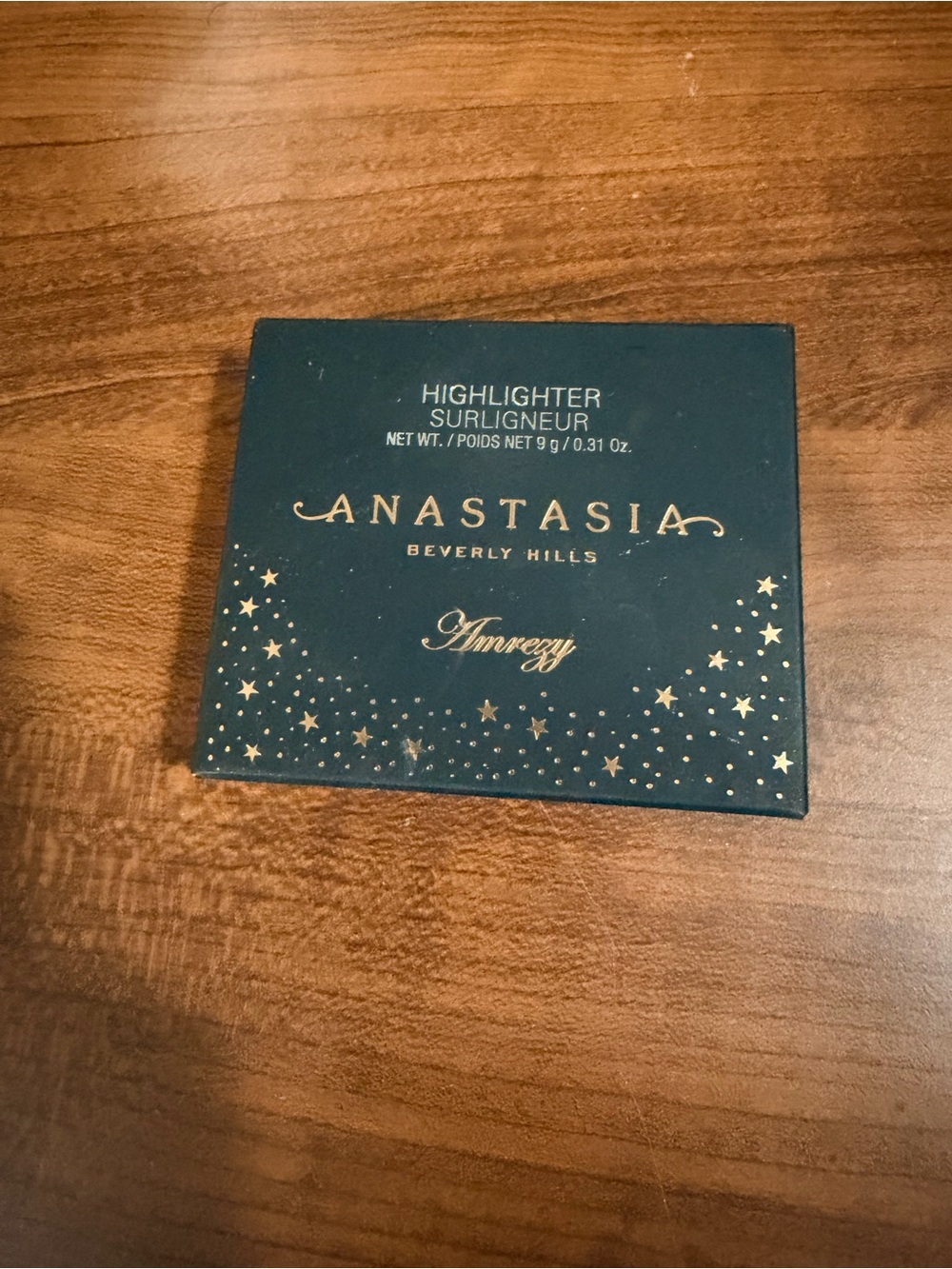 Anastasia Beverly Hills Teal Compact Highlighter with Gold Star Accents